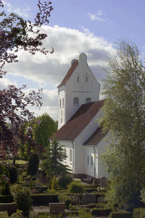 Typical danish church and graveyardの写真素材