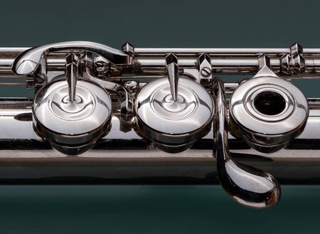 Close-up of keys of a platinum-plated silver fluteの写真素材