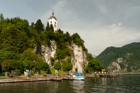 Church of Traunkirchen as seen from Traunsee in summer, Salzkammergut Austriaのeditorial素材