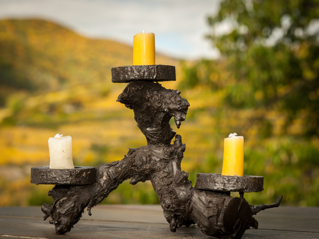 Closeup of a candle holder made of wine woodの写真素材