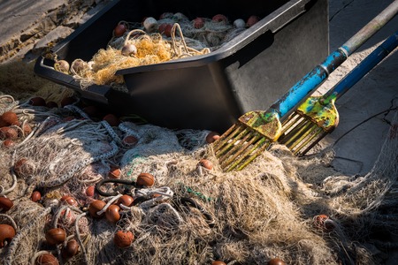 Closeup of fishing nets and forks for crabs, Cres Croatiaの写真素材