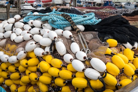 Closeup of a colorful fishing net lying on a boat, Cres Croatia
