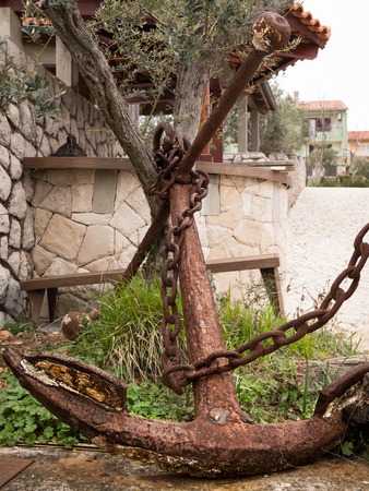 Detail of a big old rusty anchor used for decoration in Croatiaの写真素材