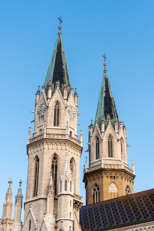 Church towers of Klosterneuburg monastery in autumn blue sky (Austria)の写真素材