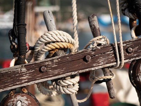 Closeup of the rigging of an old boat on a sunny dayの写真素材