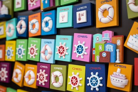 colorful magnetic souvenirs of the city of Cres (Croatia)の写真素材