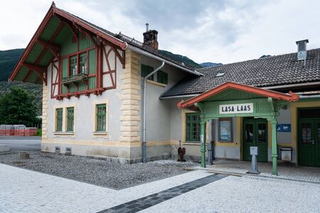 Railway station of Laas (South Tyrol, Italy) on a cloudy evening in summerの写真素材