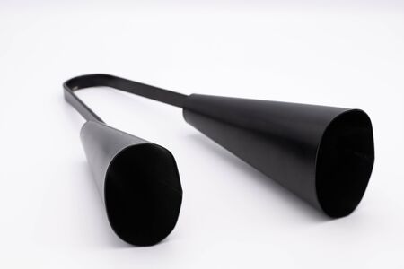 Closeup of a black agogo on a white backgroundの写真素材