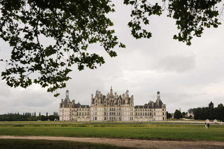 Chambord, France - August 6, 2013: ChÃ¢teau de Chambord is the largest chÃ¢teau in the Loire Valley, famous for its very distinctive French Renaissance architecture which blends traditional French medieval forms with classical Renaissance structures.のeditorial素材