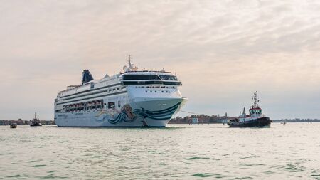 Venice, Italy - November 4, 2016: Cruise ship passing through Venice (Italy) in late autumnの写真素材