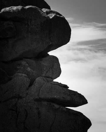Interesting rock formation (face) on Pink Granite Coast in northern Brittany (France), on a sunny day in summerの写真素材