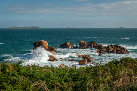Interesting rock formation on Pink Granite Coast in northern Brittany (France), on a sunny day in summerの写真素材