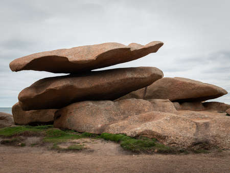 Interesting rock formation (plate) on Pink Granite Coast in northern Brittany (France), on a sunny day in summerの写真素材