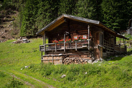Old small wooden house in the alps, sunny day in summer, East Tyrol (Austria)のeditorial素材