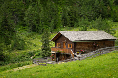 Old small wooden house in the alps, cloudy day in summer, East Tyrol (Austria)のeditorial素材