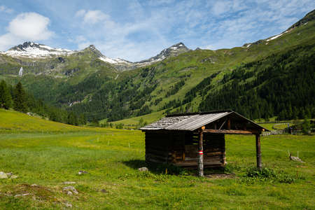 Old small wooden house in the alps, sunny day in summer, East Tyrol (Austria)のeditorial素材
