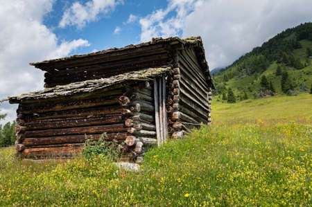 Old small wooden house in the alps, sunny day in summer, East Tyrol (Austria)のeditorial素材