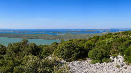 View of Kornati islands over Lake Vrana (Drage, Croatia), sunny day in late summer, blue skyの写真素材