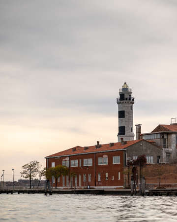 Murano, Italy - October 28, 2021: Lighthouse of Murano on a cloudy day in autumn,のeditorial素材