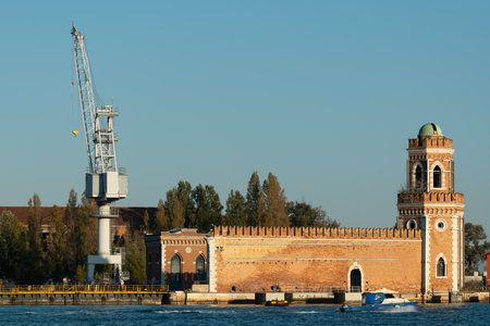 Venice, Italy - October 28, 2021: The Arsenale of Venice from the waterside on a sunny day in autumn, clear blue skyのeditorial素材
