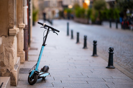 Nancy, France - September 2, 2020: An electric scooter standing on the street, cloudy day in summerのeditorial素材