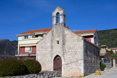 Small old church made of stone in Cres (Croatia), sunny day in springtimeの写真素材