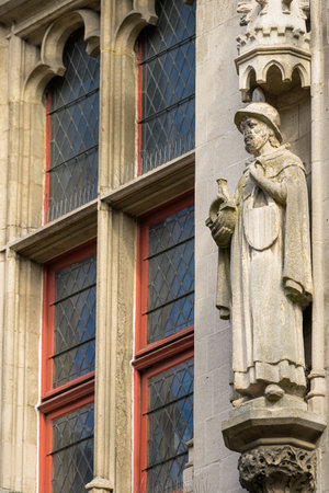 Small statue of the Burghers Lodge in Bruges (Belgium), sunny day in summerの写真素材