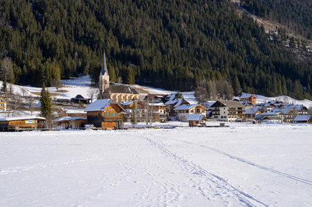 Weissensee, Austria - February 8, 2022: Lake Weissensee (Austria) on a cold sunny day in winterのeditorial素材
