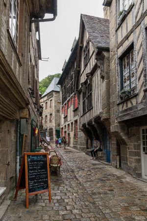Dinan, France - August 12, 2018: a small alley in the city of Dinan, daylight, summerのeditorial素材