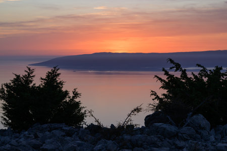 Sunset over the sea in Croatia (island Cres), blue sky