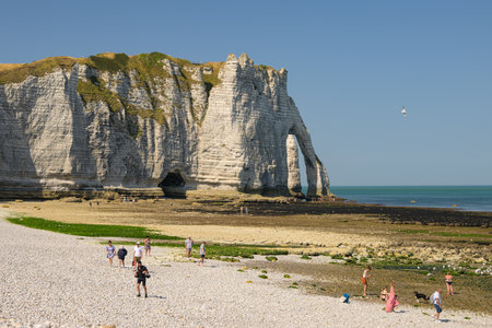 Etretat, France - July 19, 2022: Chalk cliffs of Etretat (Normandy) on a sunny day in summerのeditorial素材