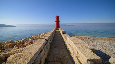 Red lighthouse of Cres on a sunny day, blue sky