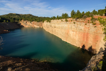 The former Mas Rouge quarry in the Alpilles Regional Park (Provence, France) on a sunny day in...