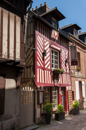 Honfleur, France - August 09, 2016: Colorful old houses in Honfleur on a sunny day in summerのeditorial素材