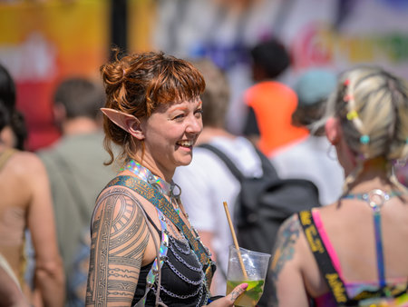Vienna, Austria - June 08, 2024: People at Vienna Pride in summer on Wiener Ringstrasse, woman with long earsのeditorial素材