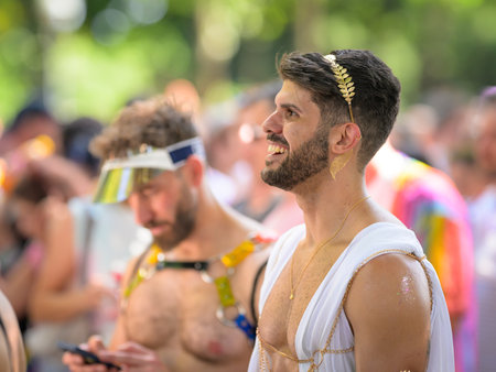 Vienna, Austria - June 08, 2024: People at Vienna Pride in summer on Wiener Ringstrasse, portrait of a manのeditorial素材