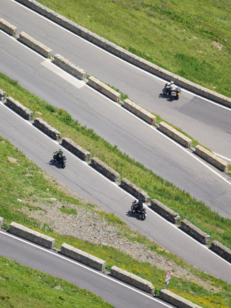 Stelvio Pass, Italy - July 15, 2023: The Stelvio Pass on a sunny day in summer, motorcycles