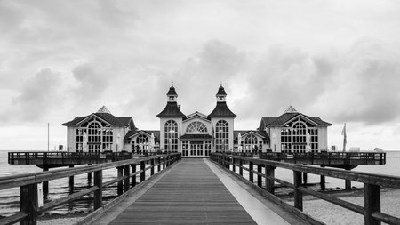 Sellin, Germany - July 1, 2024: A traditional old house standing on stilts on a cloudy dayのeditorial素材