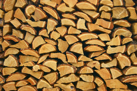Stored up on winter firewood built in row