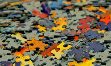 Detail of pile of scattered puzzle pieces