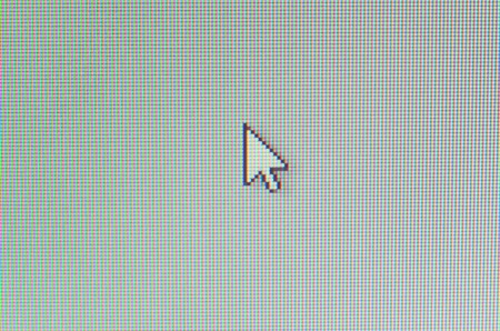 Macro detail of computer cursor on the screen formed by pixelsの写真素材