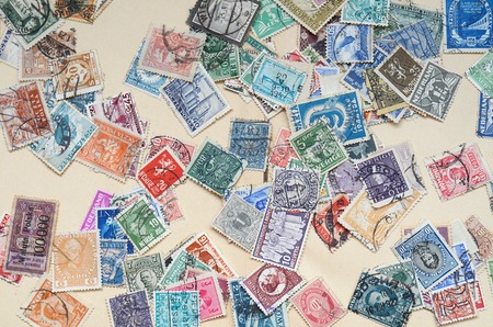 Collection of old postage stamps close-up detailの写真素材
