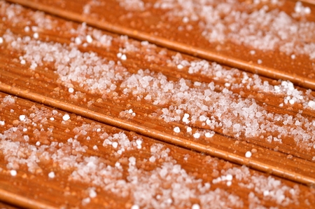 Close-up of hail on a wooden tableの写真素材