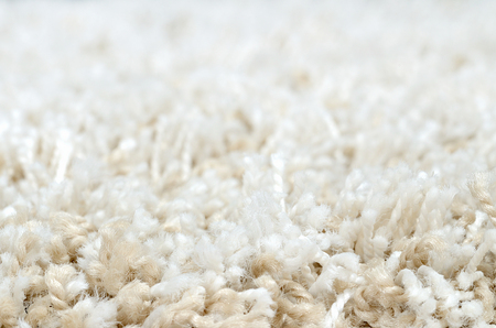 Close-up detail of white shaggy carpetの写真素材