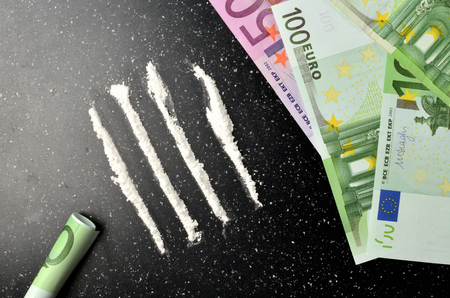 View from above of cocaine and euro banknotes money - illegal drugの写真素材
