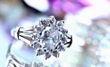Silver ring with diamonds - jewelery, cold color balanceの写真素材