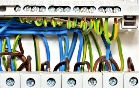 Close-up of wiring of electric cables to circuit breakers. Connection according to the Czech...