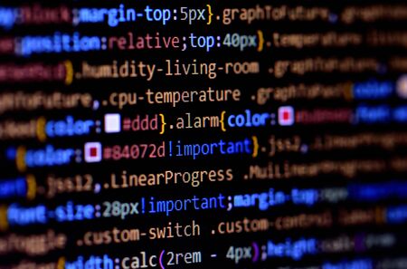 Macro of minified javascript file. Computer programming source code for HTML website development.