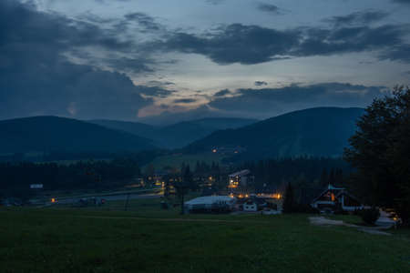 Ski resort Ramzova in Jeseniky mountains in Czech republic at sunset.の写真素材
