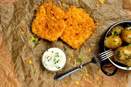 Mozzarella wrapped in cornflake, boiled potatoes greased with butter and herbs and a healthy yogurt...